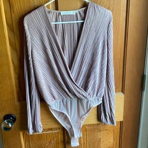 Astr M bodysuit, pink shimmer in color